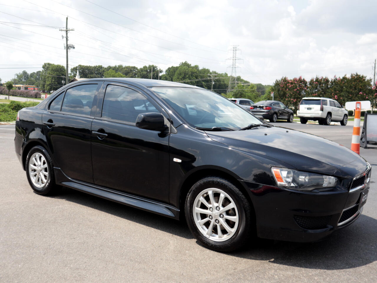 2012 Pre-Owned Mitsubishi Lancer SE AWD Sedan